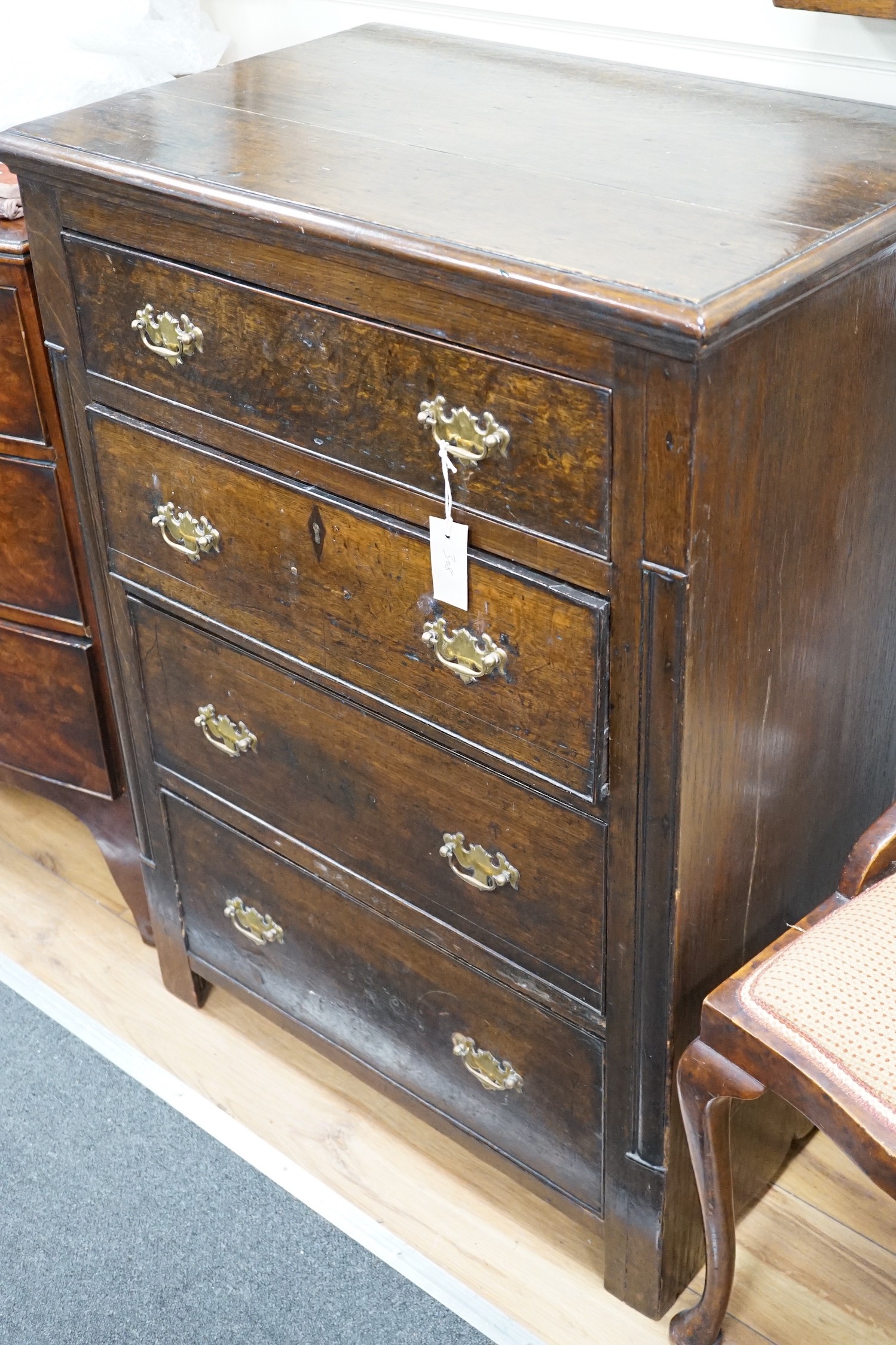 An 18th century style oak four drawer chest, width 75cm *Please note the sale commences at 9am.